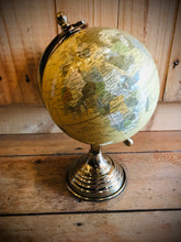 Load image into Gallery viewer, Small Cream Globe On Brass Effect Stand
